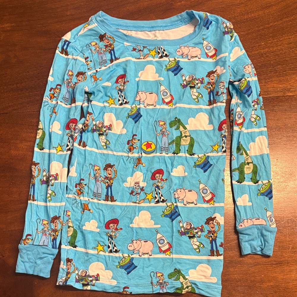 Little Sleepies Toy Story blue long sleeve two piece. 4T EUC.